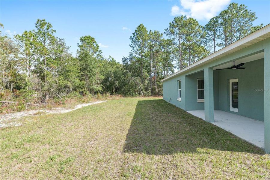 Exterior details and patio area of a home in , Citrus Springs (Image 25).
