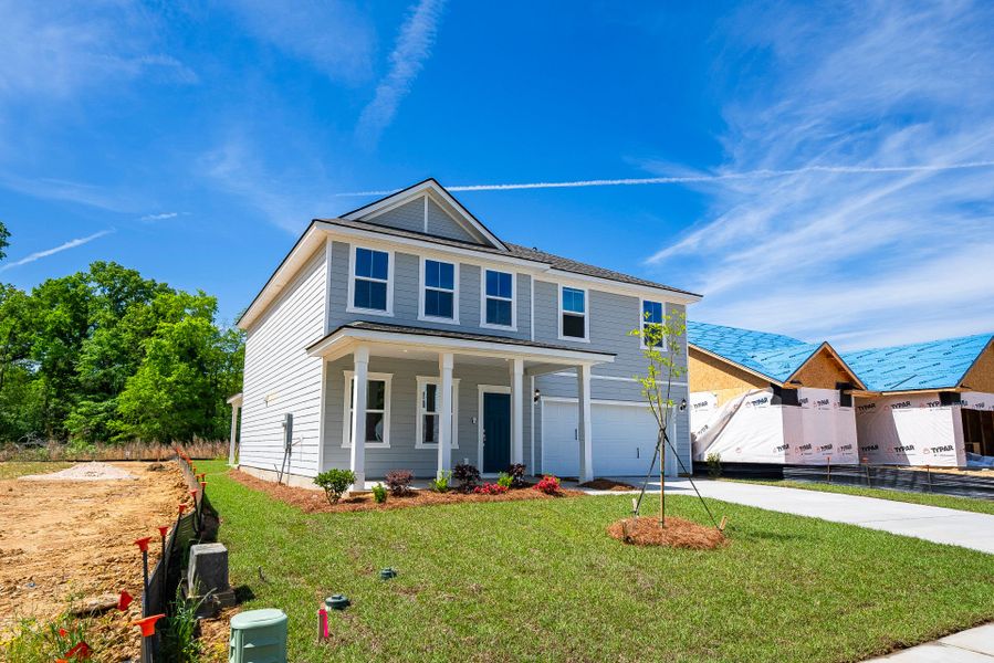 Front exterior of a new home in Monroe Preserve, Chapin, SC, highlighting curb appeal (Image 21).