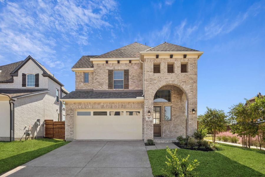 Front exterior of a new home in Solterra Texas, Mesquite, TX, highlighting curb appeal (Image 1). Front exterior of a new home in Solterra Texas, Mesquite, TX, highlighting curb appeal (Image 1).