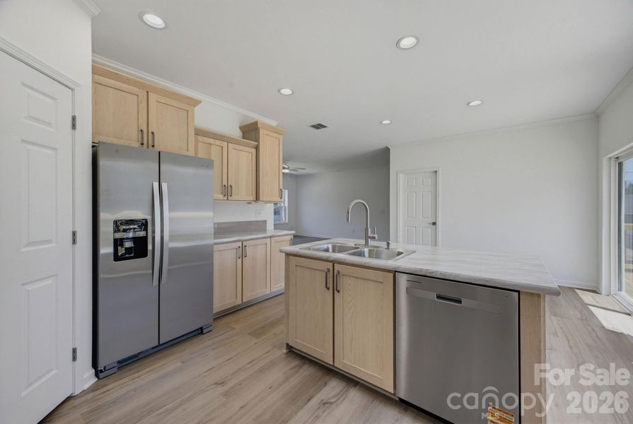 Furnished interior view inside a new home in , Newton (Image 12).