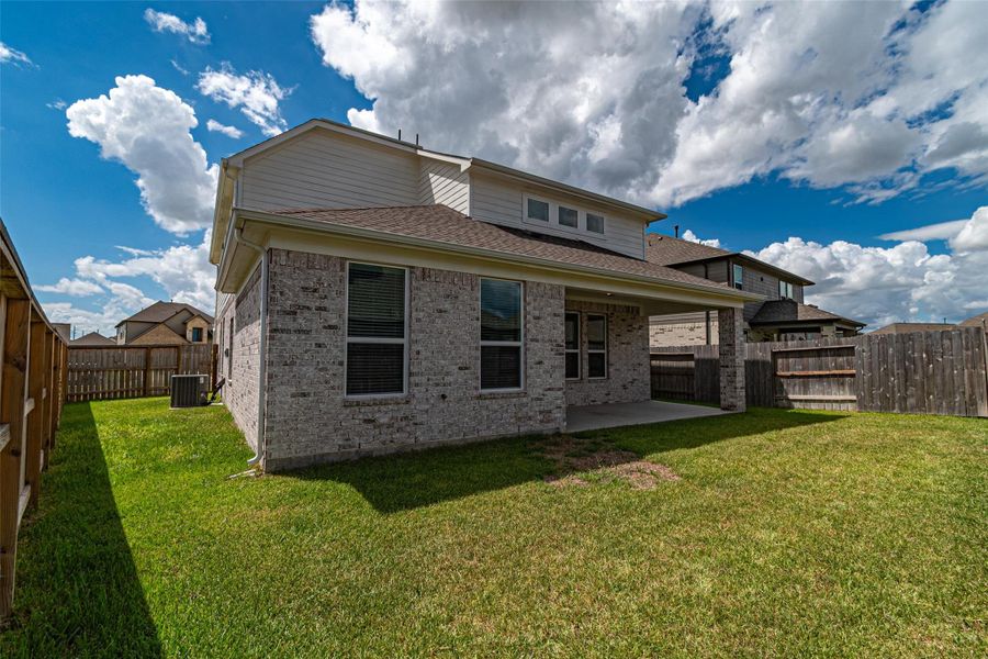 Exterior details and patio area of a home in Marvida, Cypress (Image 21). Exterior details and patio area of a home in Marvida, Cypress (Image 21).
