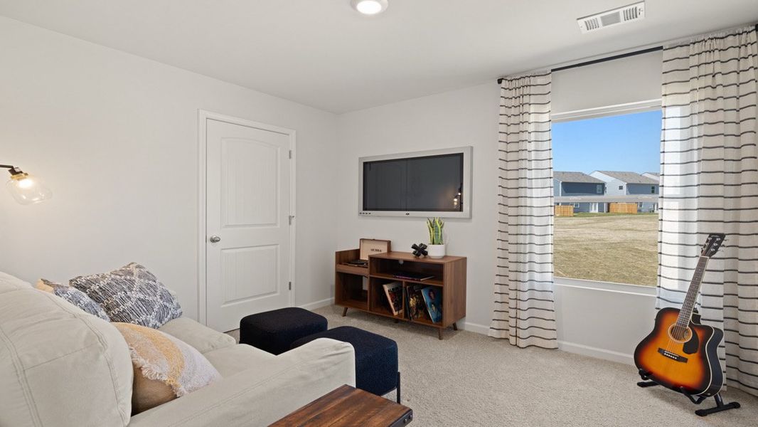 Representative furnished interior of a home built from the SUDBURY 24' TOWNHOME by D.R. Horton in Rolling Meadows, Jasper (Image 27).
