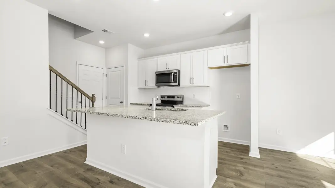 Furnished interior view inside a new home in Brightwood Farm, Whitsett (Image 3).
