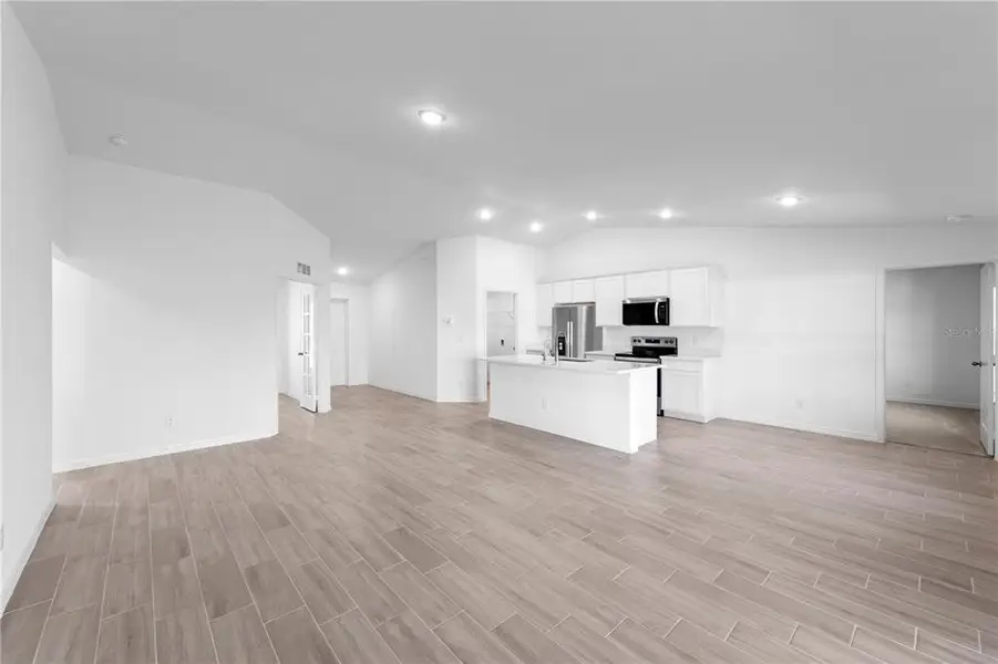 Spacious, unfurnished interior of a new home in , Port Charlotte (Image 13).
