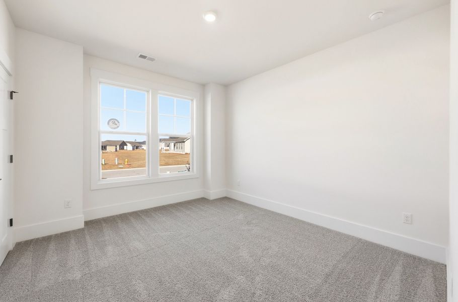 Representative unfurnished interior of a home built from the Montague II by Great Southern Homes in Oak Hollow, Longs (Image 16).