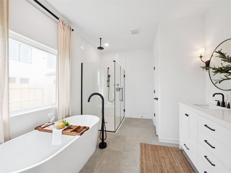 Luxurious primary bath (*Photo not of actual home and used for illustration purposes only.)