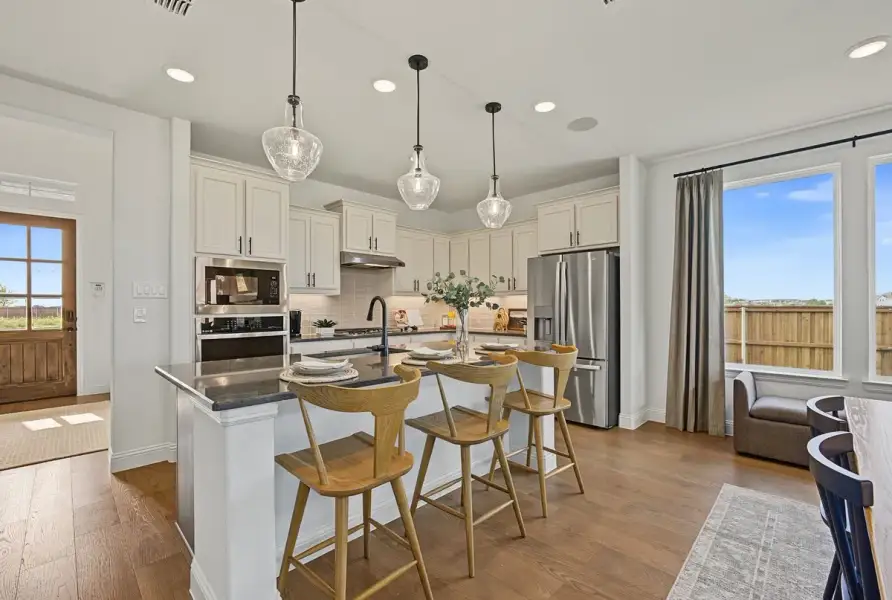 Furnished interior view inside a new home in Leonard Trails, Anna (Image 21).
