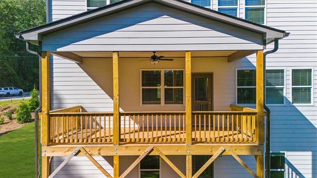Front exterior of a new home in River Rock, Ball Ground, GA, highlighting curb appeal (Image 23).