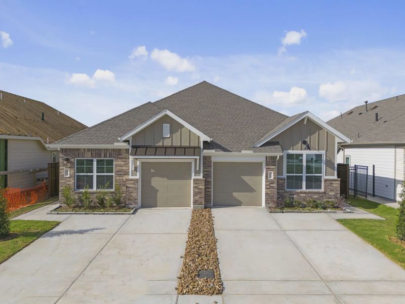 Representative exterior photo of a completed home built from the Chalet by Chesmar Homes in Meridiana Townhomes, Iowa Colony, TX (Image 23).