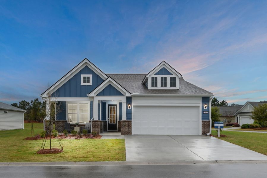 Front exterior of a new home in Del Webb North Myrtle Beach, Myrtle Beach, SC, highlighting curb appeal (Image 1).