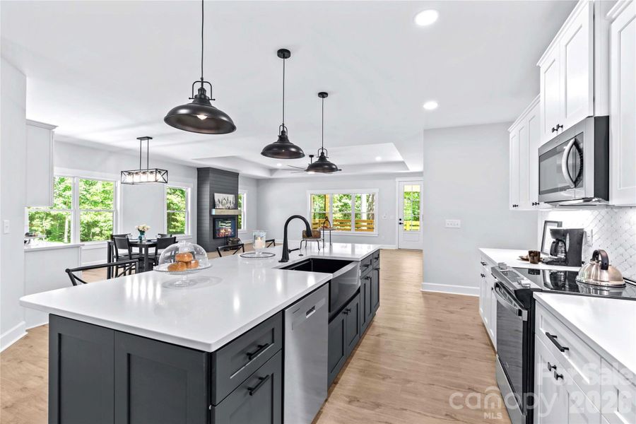 Did we mention 10 foot quartz island with storage.