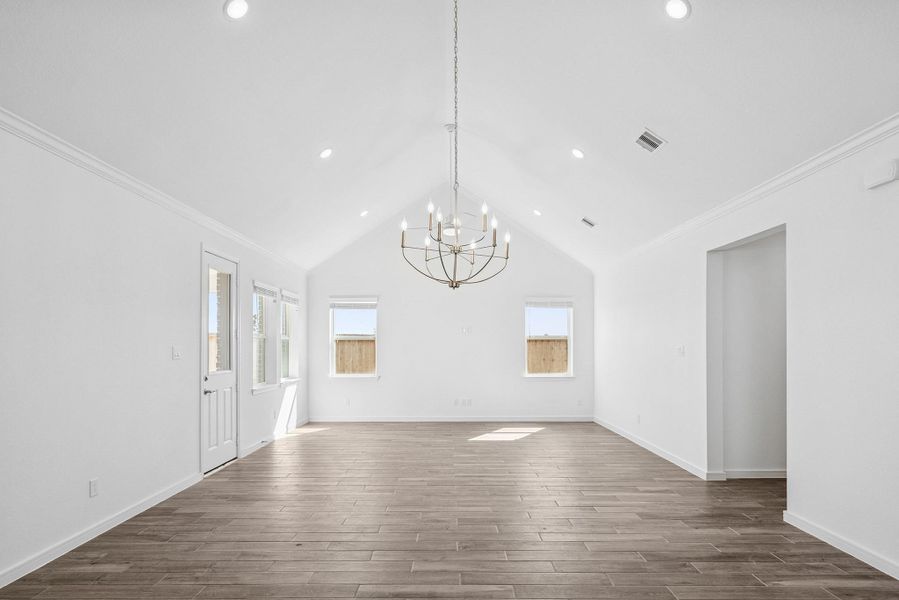 Open dining area and great room with vaulted ceilings