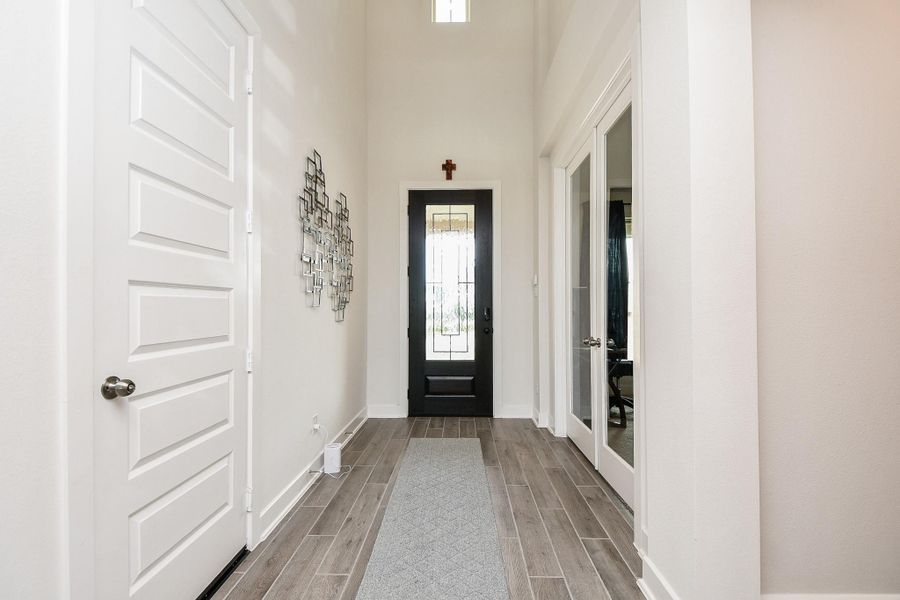 High ceiling, cool pristine walls and attractive rustic flooring all contribute to the contemporary, streamlined appeal of the home. High ceiling, cool pristine walls and attractive rustic flooring all contribute to the contemporary, streamlined appeal of the home.