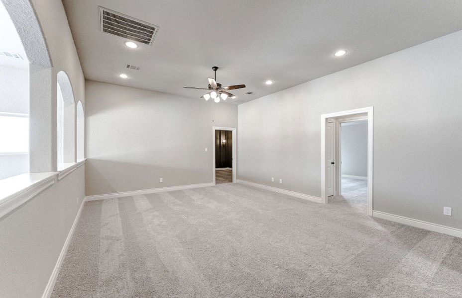 Representative unfurnished interior of a home built from the 3799 by Ravenna Homes in Artavia 70′, Conroe (Image 58).