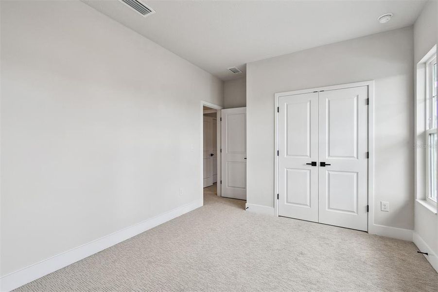Spacious, unfurnished interior of a new home in Emerald Landing at Waterside at Lakewood Ranch – Lake Series, Sarasota (Image 25).