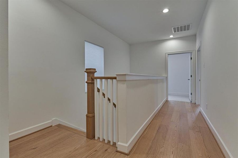 Upgraded wood flooring throughout, including gorgeous wood treads!