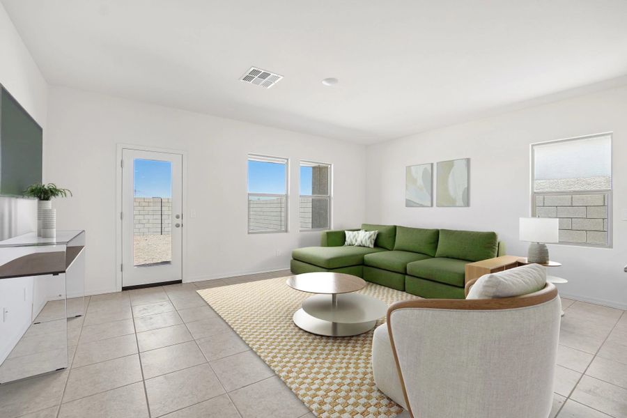 Representative furnished interior of a home built from the Moonbeam by Starlight Homes in Hawks Run, Kissimmee (Image 6).