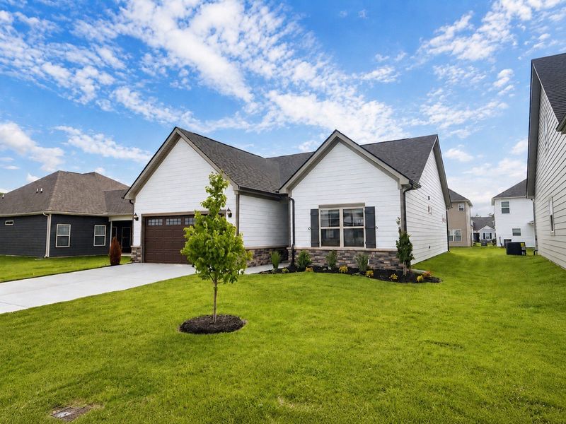 Front exterior of a new home in Salem Landing, Rockvale, TN, highlighting curb appeal (Image 15). Front exterior of a new home in Salem Landing, Rockvale, TN, highlighting curb appeal (Image 15).
