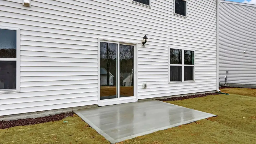 Exterior details and patio area of a home in Mangum Farms, Stem (Image 3). Exterior details and patio area of a home in Mangum Farms, Stem (Image 3).