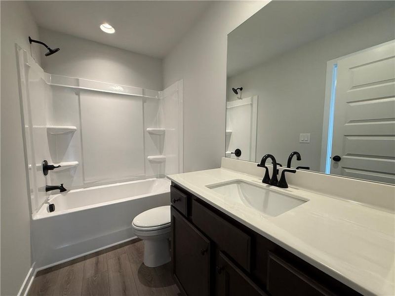 Furnished interior view inside a new home in The Towns at Auburn Station East, Auburn (Image 3).