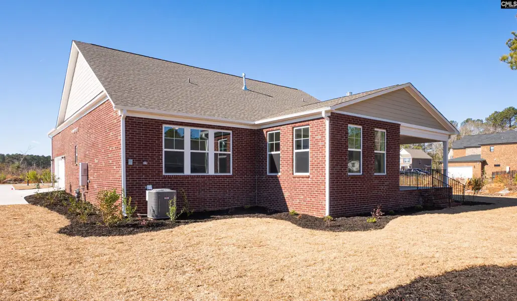 Exterior details and patio area of a home in The Cove, Sumter (Image 4). Exterior details and patio area of a home in The Cove, Sumter (Image 4).