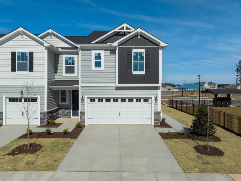 Front exterior of a new home in Powell, Angier, NC, highlighting curb appeal (Image 18).