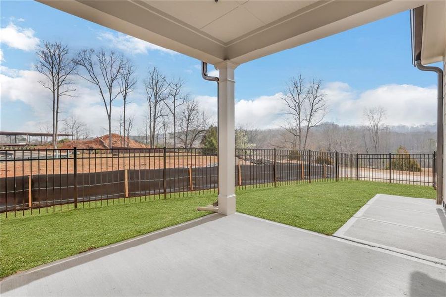 Exterior details and patio area of a home in Marble Tree, Ball Ground (Image 25).