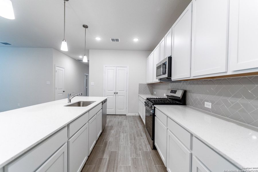 Furnished interior view inside a new home in Hunter's Ranch, San Antonio (Image 3). Furnished interior view inside a new home in Hunter's Ranch, San Antonio (Image 3).