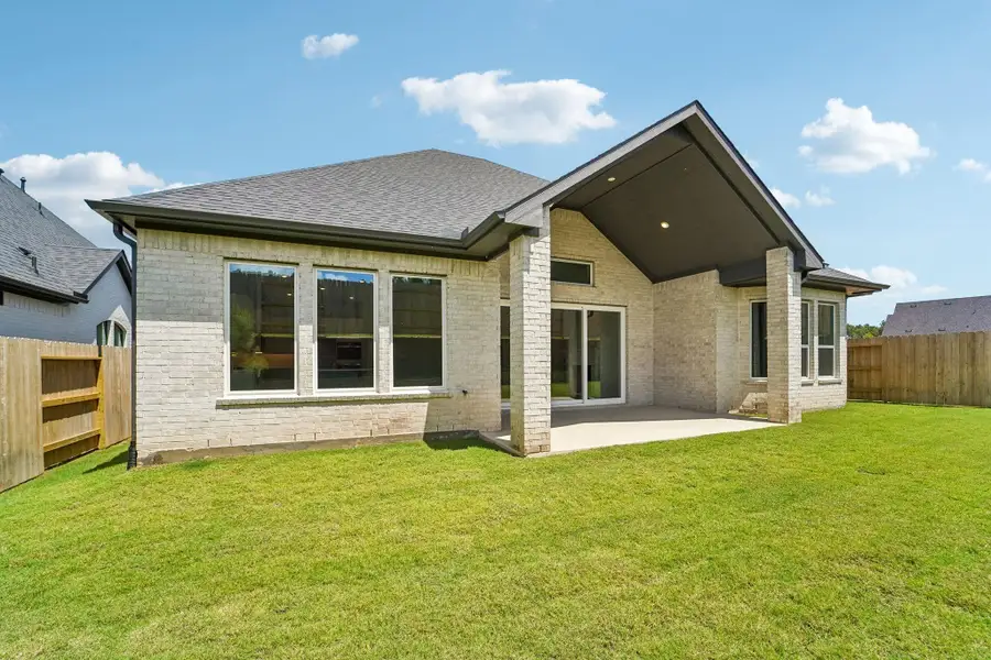 Exterior details and patio area of a home in WILDTREE 60', Montgomery (Image 3).