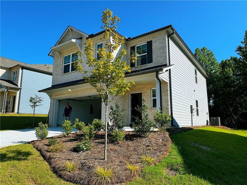 Front exterior of a new home in Deerhaven, Union City, GA, highlighting curb appeal (Image 1). Front exterior of a new home in Deerhaven, Union City, GA, highlighting curb appeal (Image 1).