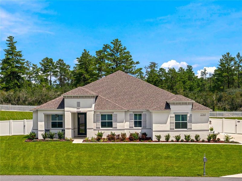 Front exterior of a new home in Marion Oaks, Ocala, FL, highlighting curb appeal (Image 22).