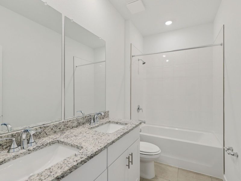 Furnished interior view inside a new home in Lakes at Bella Lago - Signature Series, Green Cove Springs (Image 7).