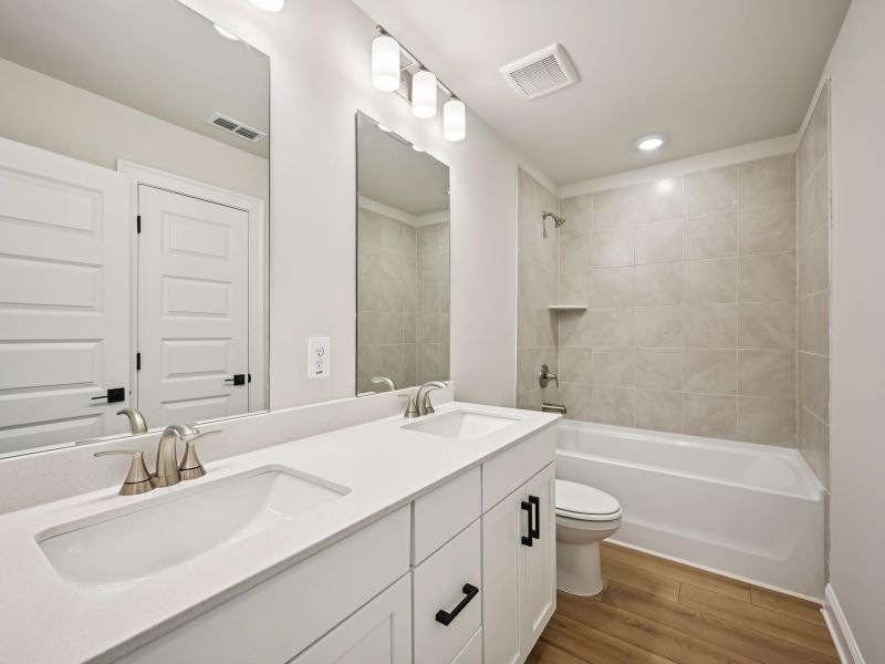 Furnished interior view inside a new home in Martin Springs - Highland Series, Lawrenceville (Image 9).
