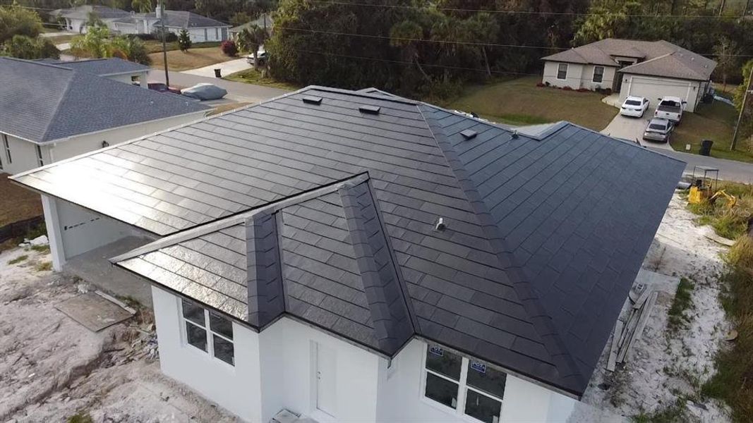 Front exterior of a new home in , North Port, FL, highlighting curb appeal (Image 15).