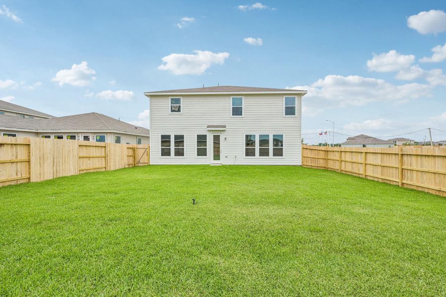 Expansive corner lot with massive backyard green space—a true blank slate ready for your dream pool, outdoor kitchen, or personal garden oasis.