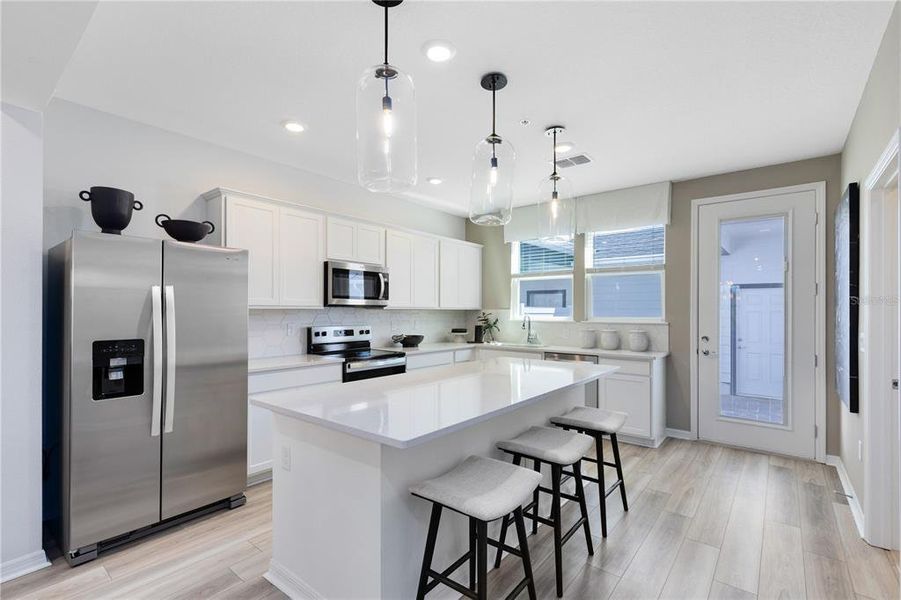 Furnished interior view inside a new home in EverBe, Orlando (Image 11).