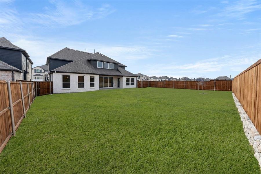 Exterior details and patio area of a home in Sutton Fields, Celina (Image 3).