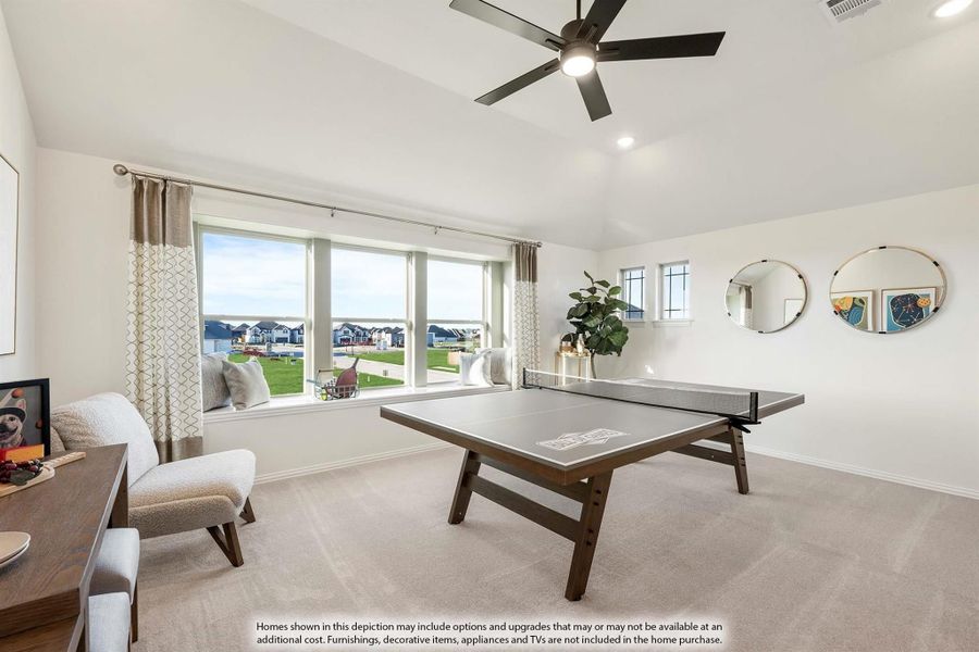 Game room with ping pong table, ceiling fan, carpet flooring, and large windows with neighborhood view