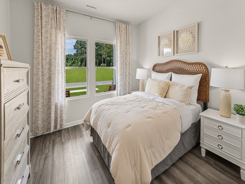 Secondary bedroom in the Taylorsville floorplan at a Meritage Homes community in Wendell, NC.