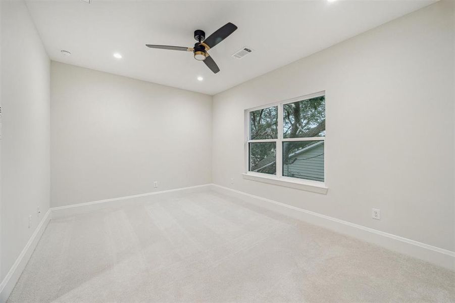 One of four secondary bedrooms upstairs