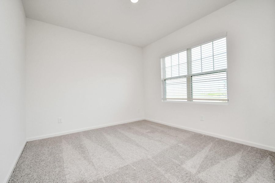 Spacious, unfurnished interior of a new home in Sunterra, Katy (Image 16).