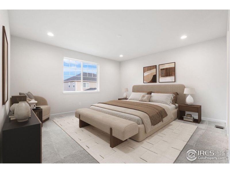 Main Level spacious primary bedroom with a connected ensuite primary bathroom. This photo has been virtually staged to provide visual ideas for how furniture can be arranged in this area of the home.