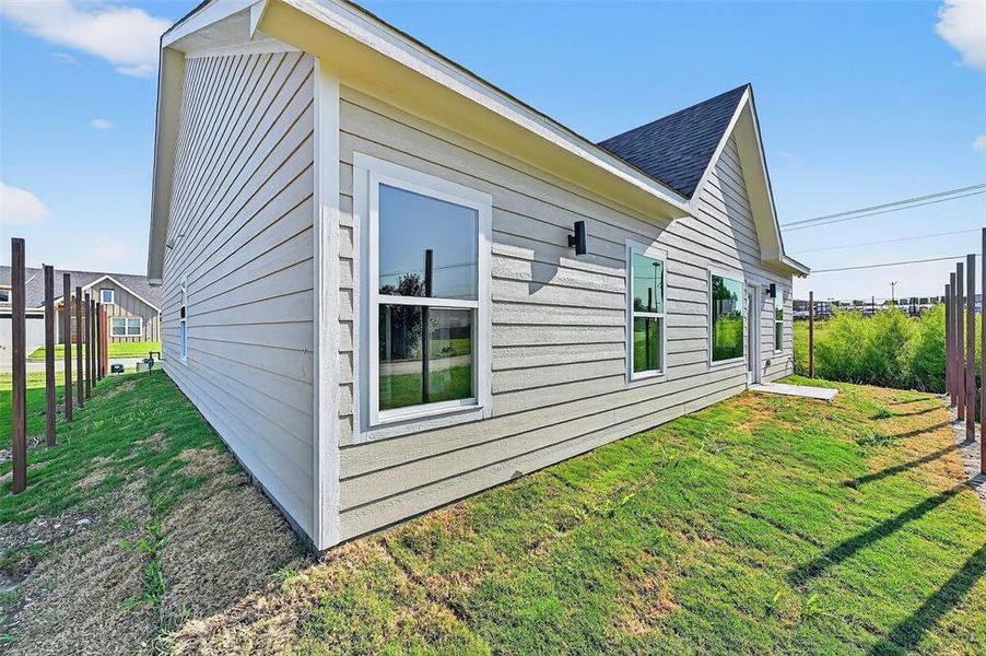 Front exterior of a new home in , Sherman, TX, highlighting curb appeal (Image 17).