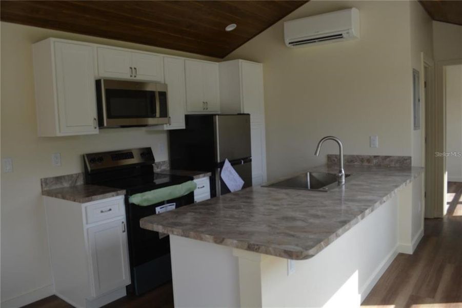 Furnished interior view inside a new home in , Oviedo (Image 4).