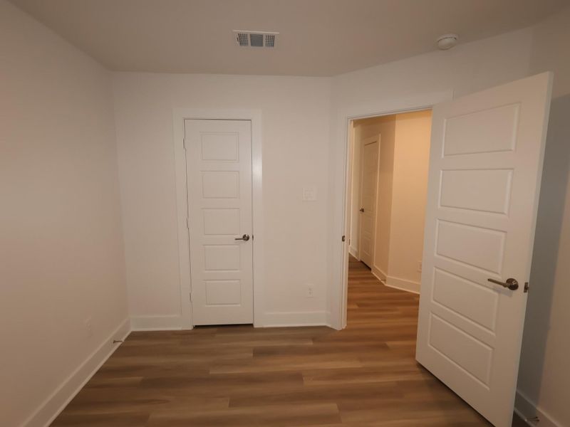 Spacious, unfurnished interior of a new home in Lone Star Landing, Montgomery (Image 38).