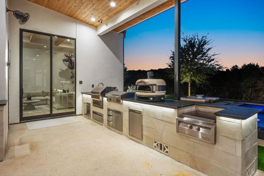 Exterior details and patio area of a home in , Spicewood (Image 22).