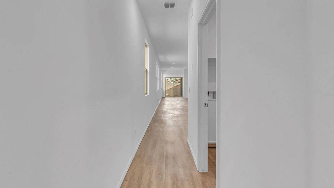 Spacious, unfurnished interior of a new home in Coronet at Gladden Farms, Marana (Image 18). Spacious, unfurnished interior of a new home in Coronet at Gladden Farms, Marana (Image 18).