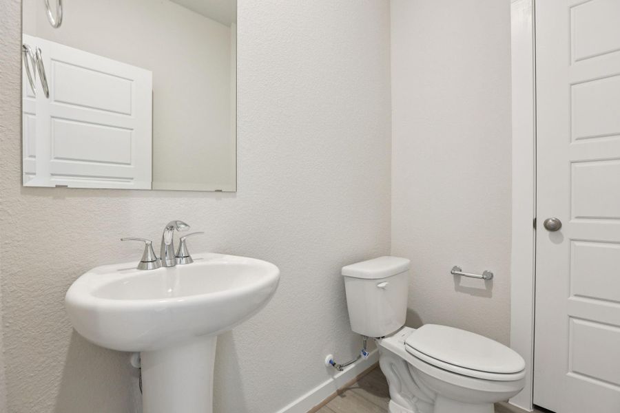Photos are not of the actual home, but are photos of the builder home with same floorplan with similar interior finishes.