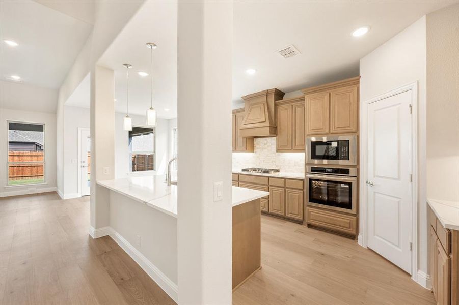 Furnished interior view inside a new home in Country Lakes Classic 60, Argyle (Image 8).
