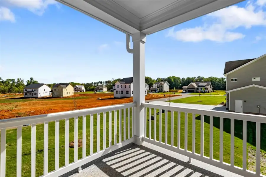Exterior details and patio area of a home in Lilah Grove, Summerfield (Image 3).